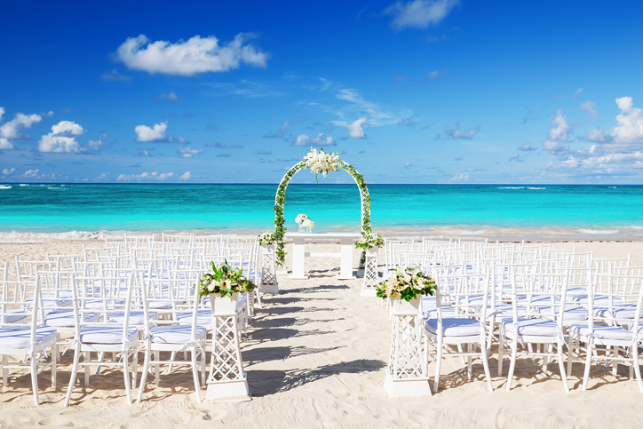 Overseas wedding taking place on a beach